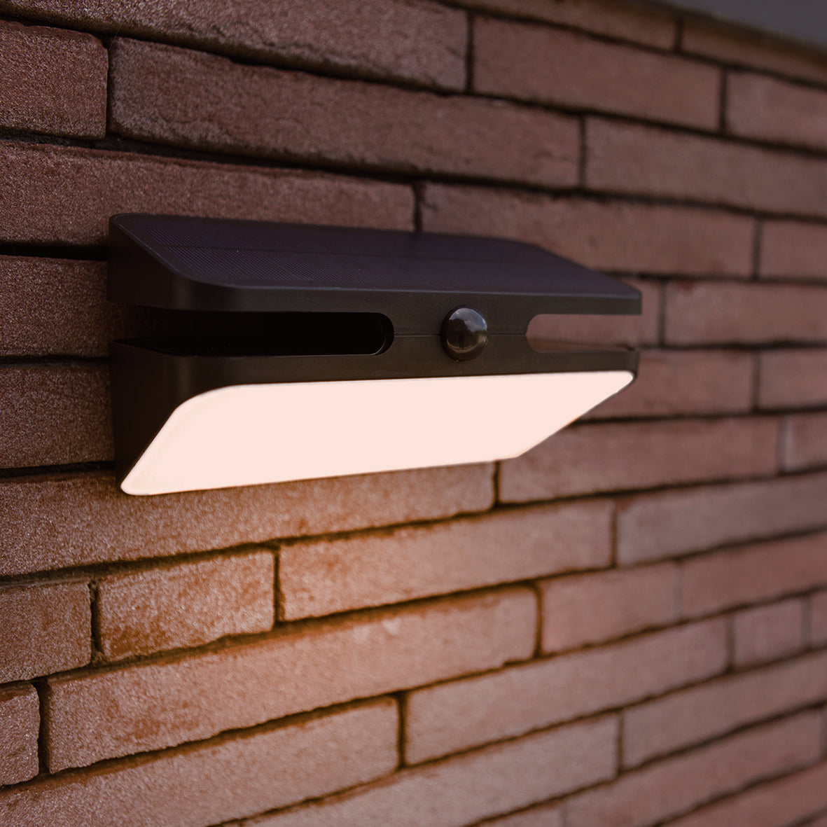 Lutec Aero PIR Outdoor LED Solar Wall Light - Black