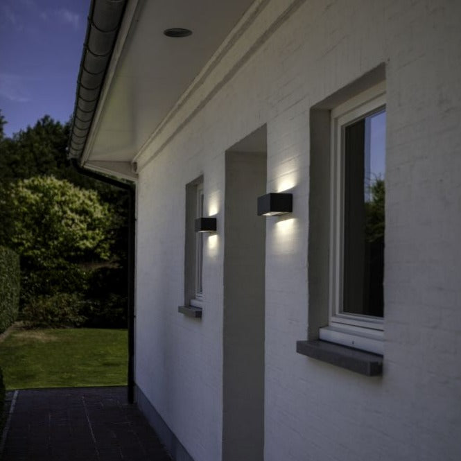 Lutec Gemini IP54 Integrated LED Outdoor Wall Light - Grey 5189112118 outside a back door