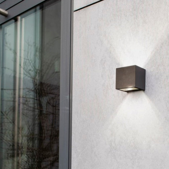 Lutec Gemini Outdoor LED Up & Down Wall Light In Dark Grey 5189114118 attached to an outside wall
